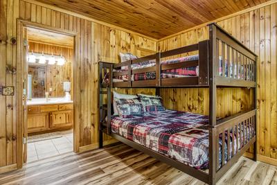 Triple the Mountain View queen over queen bunk beds in lower level bedroom