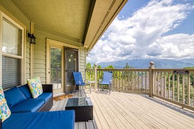 Triple the Mountain View upper level deck with cushioned furniture