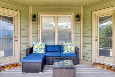 Triple the Mountain View cushioned outdoor furniture on the upper level deck