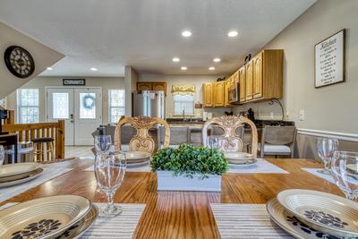 Triple the Mountain View dining table and fully furnished kitchen