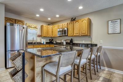 Triple the Mountain View bar top and fully furnished kitchen