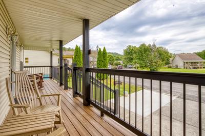 Lee's Creekside main level covered entry deck