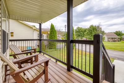 Lee's Creekside main level covered entry deck