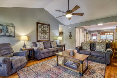 Whispering River living room with recliner
