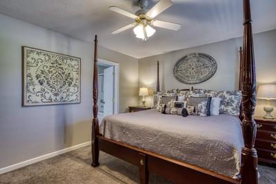 Whispering River bedroom on main level with king size bed