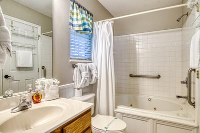 Whispering River main level bathroom two with whirlpool tub 