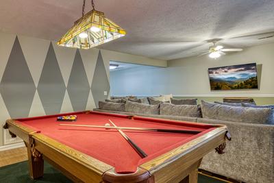Whispering River pool table in lower level game room