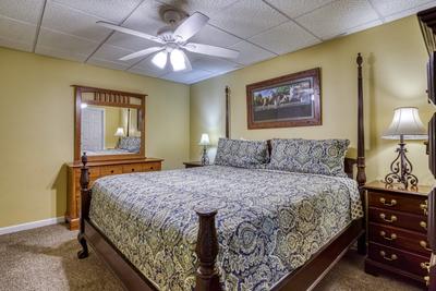 Whispering River lower level bedroom with king size bed