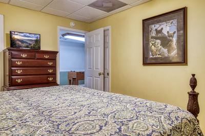 Whispering River king size bed in lower level bedroom