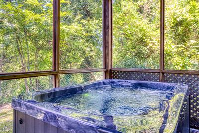 Whispering River hot tub on lower level patio
