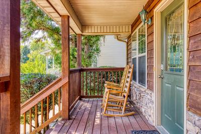 Whispering River covered entry deck