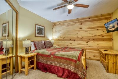 Forest Hollow queen size bed in main level bedroom