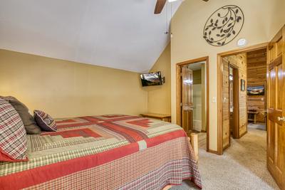 Forest Hollow upper level bedroom with king size bed