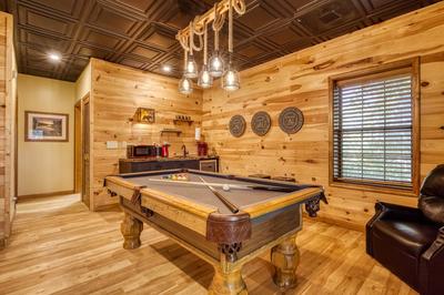 Forest Hollow lower level game room with pool table