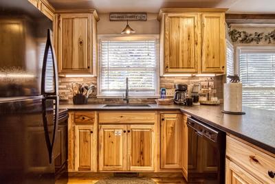 The Playful Bear fully furnished kitchen with granite countertops