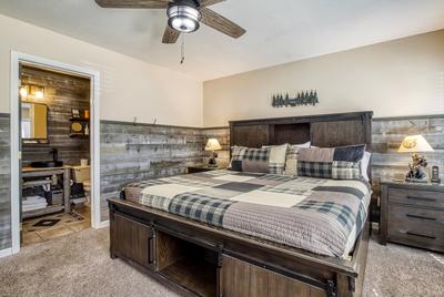 The Playful Bear main level bedroom with king size bed