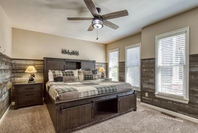 The Playful Bear king size bed in main level bedroom one