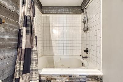 The Playful Bear main level bathroom one with whirlpool tub