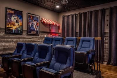The Playful Bear lower level theater room with popcorn machine