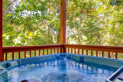 The Playful Bear hot tub on lower level deck