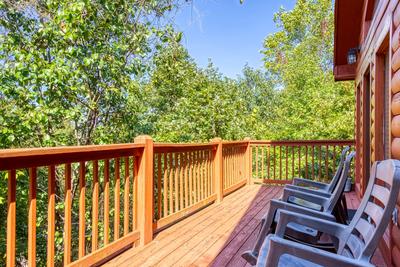 The Playful Bear main level deck with sitting area