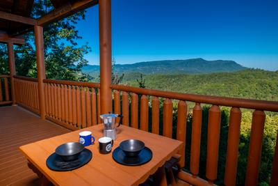 Pigeon Forge One Bedroom Cabin Rental Dinning with views of the Great Smoky Mountains