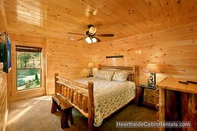 King bedroom with tv in cabin near Gatlinburg A View For All Seasons