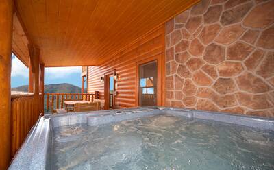Private hot tub at 8 bedroom cabin in Pigeon Forge Cades Cove Castle