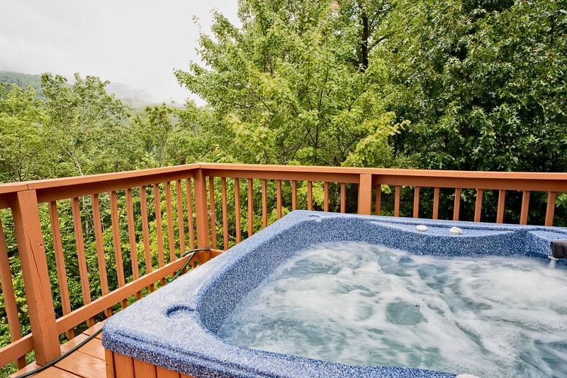 Gatlinburg - Bubbling hot tub at this 1 bedroom Gatlinburg cabin