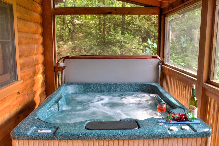 Private hot tub on the screened in deck