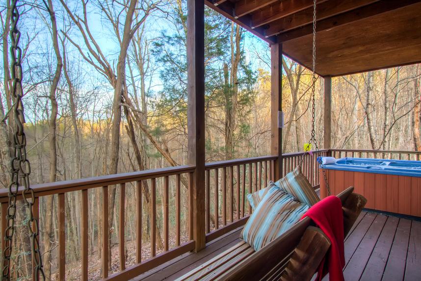 Back Deck with hot tub and sitting area