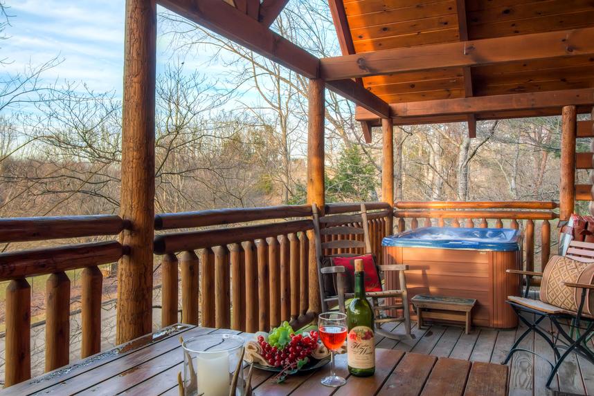 Hot tub and eating area outside on deck