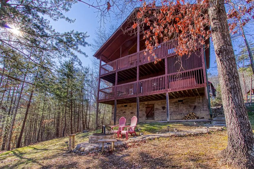 Back of Morning Glory Cabin showing multi-level decks and fire pit