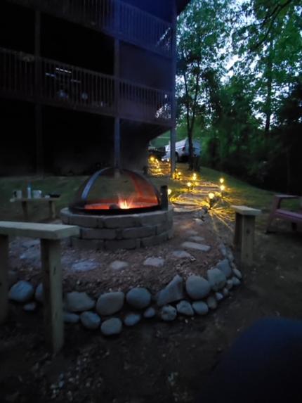 Fire pit in back of Morning Glory Cabin