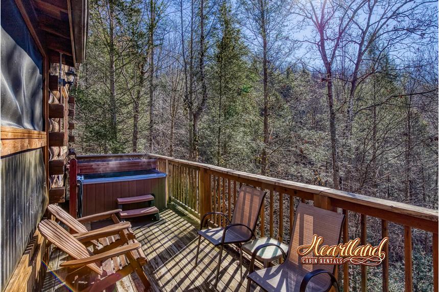 large deck with hot tub