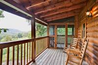 Wooden rocking chairs on the deck to enjoy your morning coffee