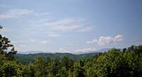 Mountain views at this one bedroom Pigeon Forge cabin rental