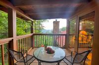 Private deck off of the master bedroom of this private cabin between Pigeon Forge and Gatlinburg