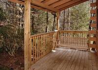 Swing and enjoy nature at this cabin near Gatlinburg and pigeon forge tn