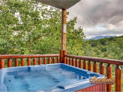 Relax in this luxurious hot tub overlooking the Smoky Mountains