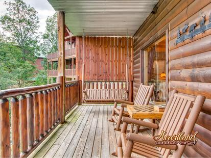 Relax in the rocking chairs and porch swing with checker board