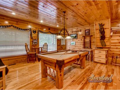 Spacious game room with pool table