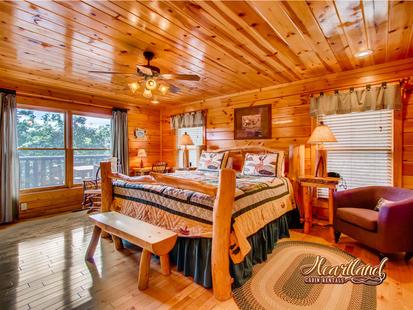 Spacious bedroom of this luxury cabin near Gatlinburg