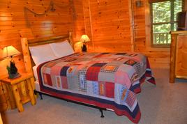 Lower level bedroom #3 with a queen bed Lower level bedroom #3 with a queen bed