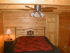 Knotty and Nice cabin bedroom