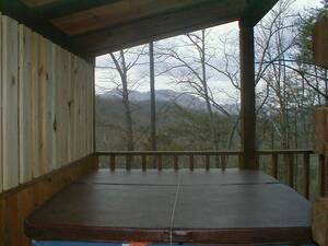 Knotty and Nice cabin hot tub