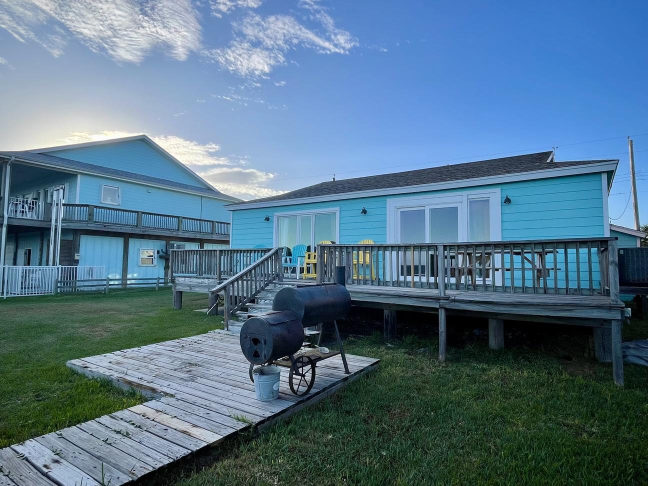 Waterfront Rockport vacation home with elevated deck and charcoal grill