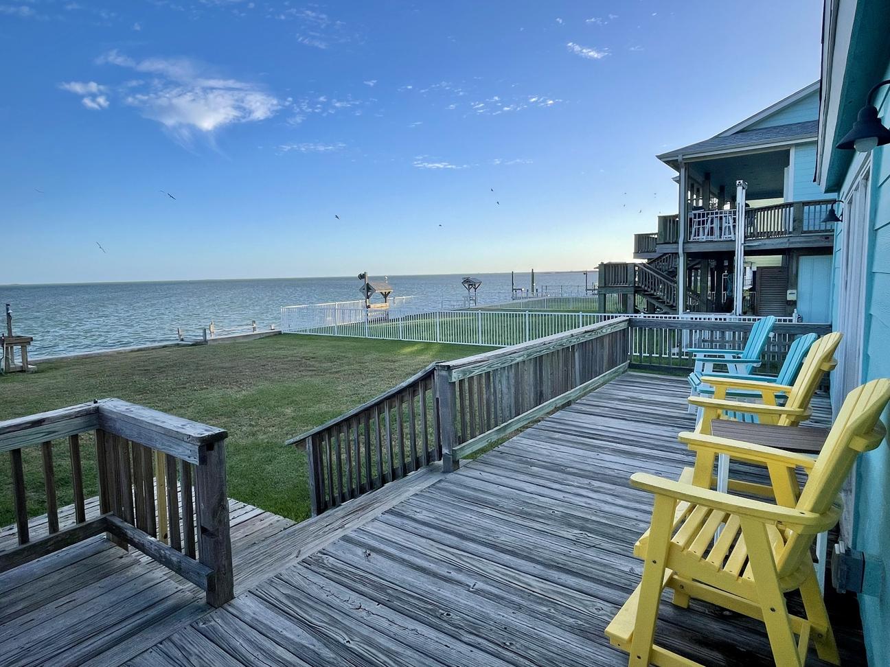 Back deck with chairs showing views of Estes Flats and the Intracoastal Waterway