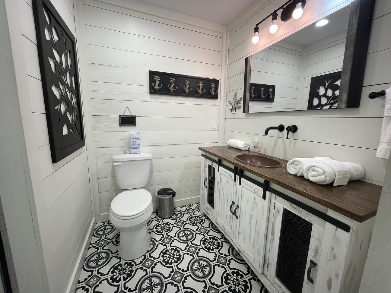 Bathroom with sink vanity and walk-in shower in Rockport rental
