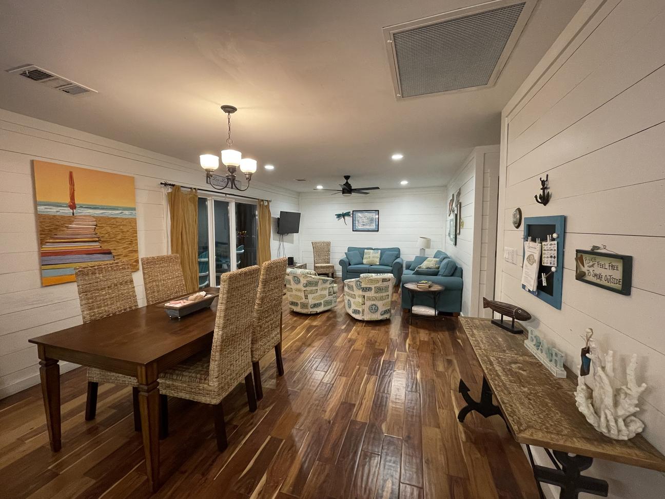 The view from the kitchen of the dining room and living room